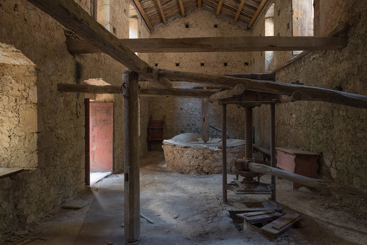 Old olive press in Nimfes